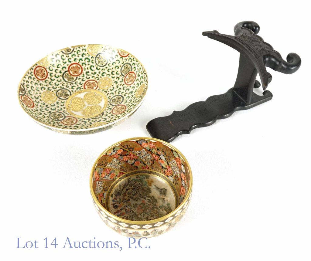 Japanese Satsuma Pottery (2): Two Satsuma pottery bowls and Japanese wood stand for larger bowl. Two small chips inside rim of larger bowl, no other cracks, breaks, repairs, chips or significant scratches. Larger bowl: 7.5" diamet