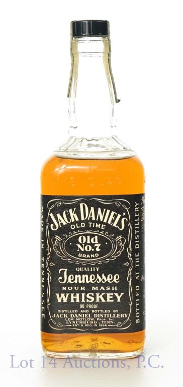 Jack Daniel's Whiskey - Len Motlow Cameo: Jack Daniel's no. 7 sour mash Tennessee whiskey. 1973, 90 proof, 4/5 quart, low neck fill. This bottle has a special strip across the cap that feature a portrait of Len Motlow and is commonly known as