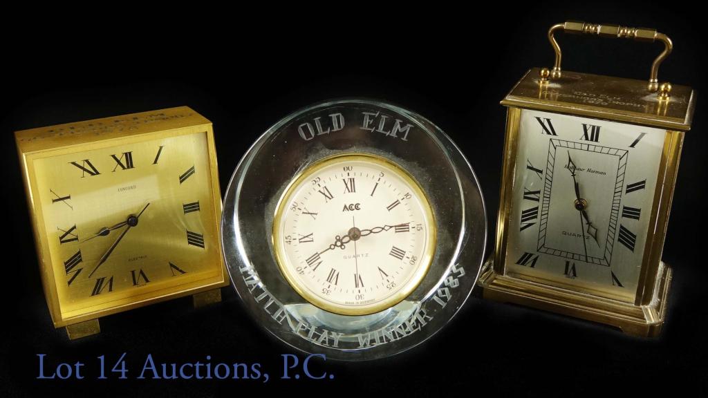 Brass & Crystal Old Elm Carriage Clocks 1970s (3): Lot of 2, vintage, brass carriage clocks. One is a rectangular, Matthew Norman clock (quartz and Swiss printed on face of clock), and is etched with the phrase "Old Elm Governer's Trophy 1979". A few