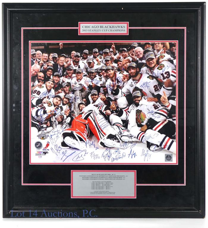 2013 Chicago Blackhawks Signed Photo (PSA COA): 2012-2013 Chicago Blackhawks Stanley Cup Champions Autographed Team Photo (PSA DNA COA). Frame measures 33x35. This amazing piece of Chicago history features 25 signatures total from the championship