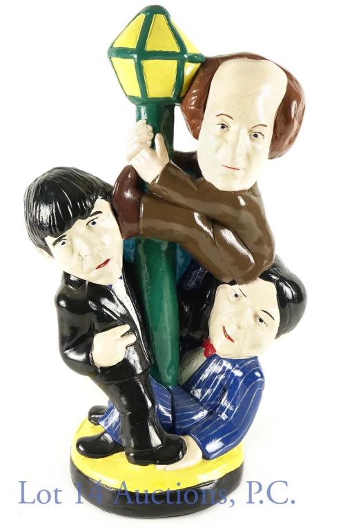 Three Stooges Chalkware Statue Tuscany Studios '75: Chalkware statue featuring the three stooges hanging on to a light post. It is signed on the back side of the base: Tuscany NY Studios Inc, 1975. There is a 2mm, shallow chip on the back of Mo's elbow