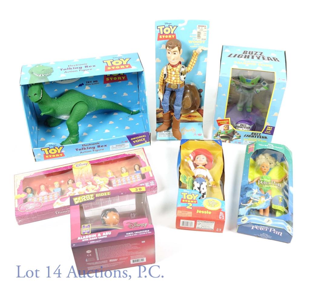 Disney Collectibles (7): 7 Different Disney collectibles (Toy Story, Disney Princess's, Aladdin, Peter Pan). All of the figures come in original boxes and are sealed. Pez Enchanted Tales Disney Princess Set. 1993 Disney Peter