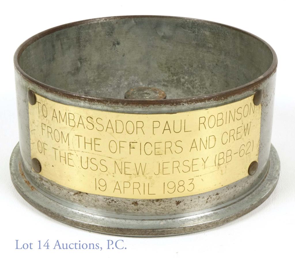 USS New Jersey Navy 5" Gun Shell Trench Art: Primer rim from a 5 inch gun shell, Attached plaque reads: TO AMBASSADOR PAUL ROBINSON FROM THE OFFICERS AND CREW OF THE USS NEW JERSEY (BB-62) 19 APRIL 1983. "Big J" had a whopping 20 5"/38 caliber g