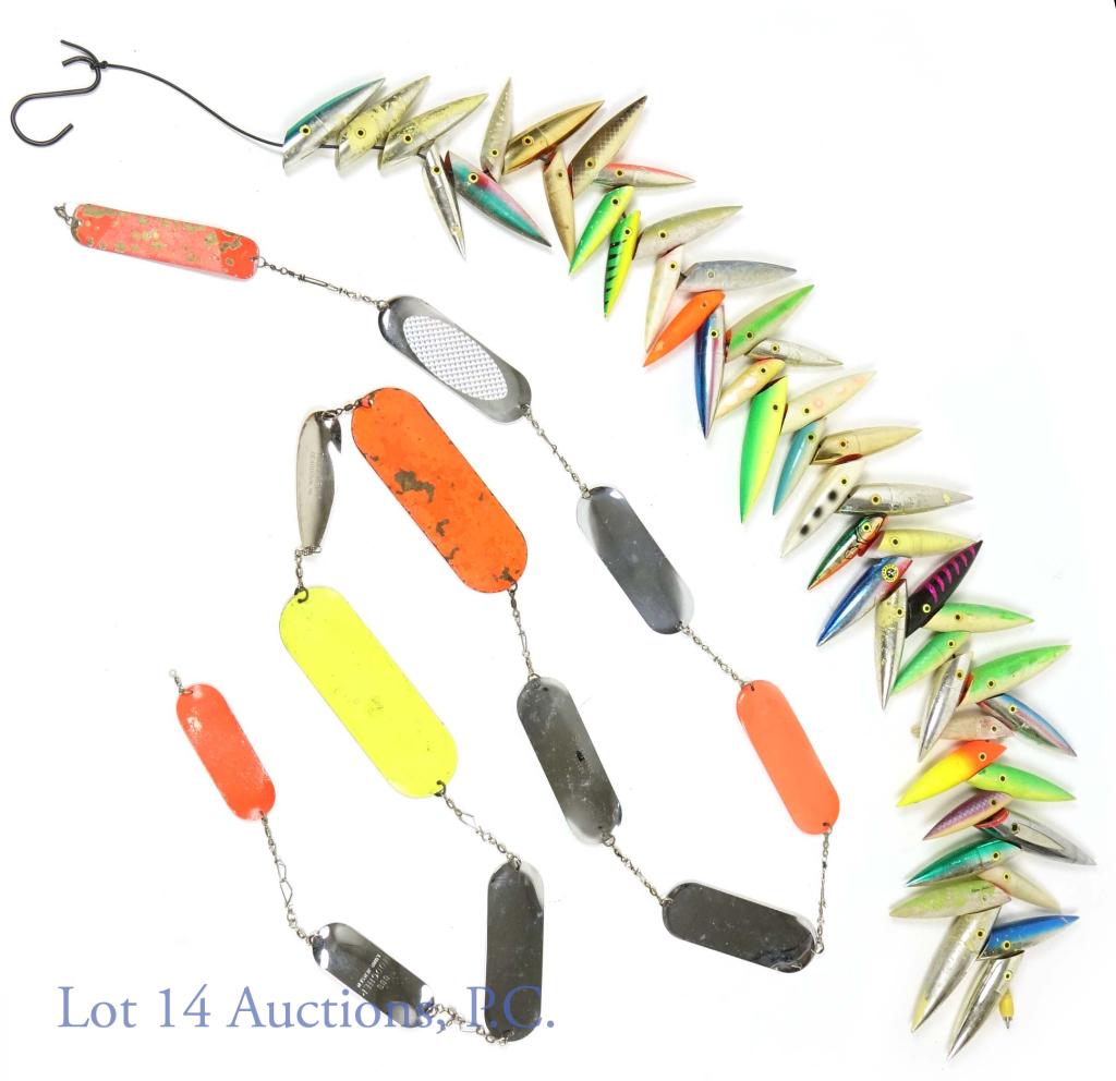 Fishing Flasher, Dodger, Lure and J-Plug Lot: 12 Fishing Flashers and Dodgers connected together. Ranging from 4.5" to 8" in length. 47 Fishing J-Plugs and Lures of varying colors and designs. Most are made by Luhr Jensen. Ranging from 4" to 5.5"