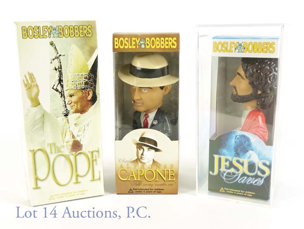 Religious Gangster Bobbleheads (Bosley) (3): Religious Gangster Bobbleheads (Bosley Bobbers) (3 Total). All of the bobbleheads in this lot come in their original boxes. Includes a Bosley Bobbers Scarface Alphonse Capone (Al Capone) Bobblehead, B