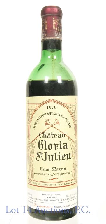 1970 Chateau Gloria St. Julien: Vintage 1970 French red table wine. 12% abv. 3/4 quart. Product of France. Sediment is present at bottom of bottle. Some rusting on bottom wrapping of capsule. Capsule does have staining on top and is