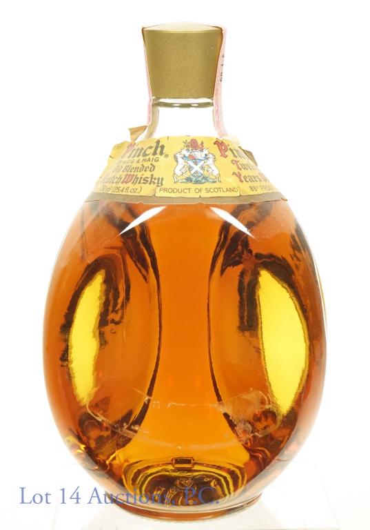 Pinch 12 Yr Old Haig & Haig Scotch Whisky: Pinch by Haig & Haig Old Blended Scotch Whisky. 86 proof, 750ml. No-series tax strip. High shoulder fill.