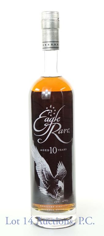 Eagle Rare 10 Year Bourbon Whiskey: *** IF YOU MAY NEED SHIPPING, PLEASE CALL US BEFORE BIDDING ON BOTTLES! 847-625-0555. *** Eagle Rare Kentucky straight bourbon whiskey. 10 years. 90 proof. 750 ml. Etch: L22145 0122:26B.