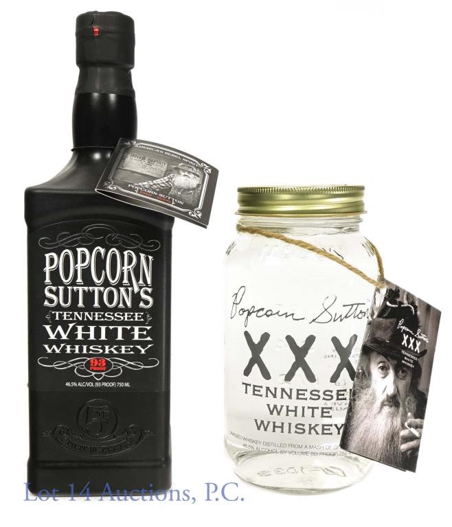 Popcorn Sutton's TN White Whiskey (2): Popcorn Sutton's Tennessee White Whiskey in (Jack Daniel's style) matte black bottle, with neck tag. Popcorn Sutton's Tennessee White Whiskey in Mason jar, with neck tag. Both are 93 proof, 750ml.