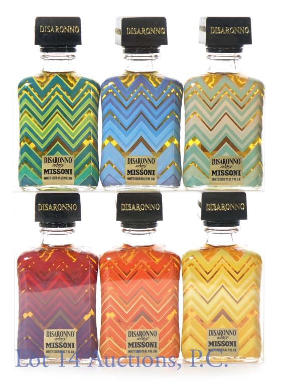 Amaretto di Sarono Missoni Minis (2 Sets): (2) sets of Amaretto di Sarono Missoni mini bottles - each of the six bottles has a unique coloration. 28% ABV. 50 ml. Both sets are in sealed plastic packaging.