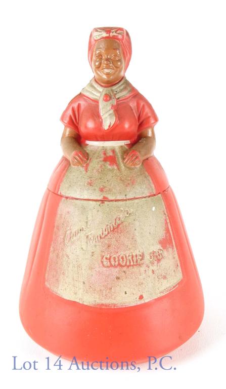 1950's Aunt Jemima Plastic Cookie Jar: 1950's Aunt Jemima plastic 2 piece promotional cookie jar. We could not find any markings to indicate who manufactured this particular piece. The cookie jar stands 10 inches tall and has a diameter of