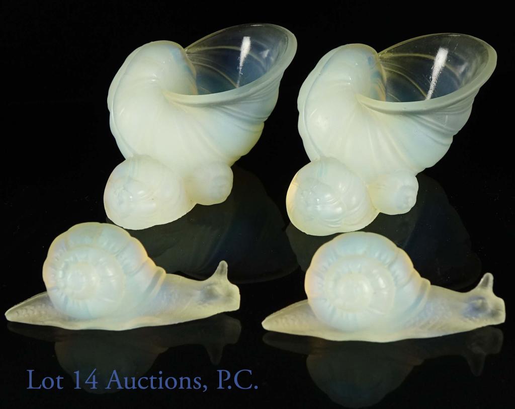 Sabino Paris Opalescent Art Glass Snails & Dishes: Two snails, signed "Sabino Paris" and two snail dishes / bowls, signed "Sabino France". One bowl has a scratch (approx. 1 - 1.25" long). Some flaws and bubbles are visible in the glass. Dishes are app