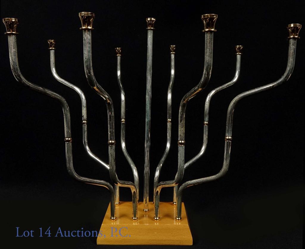 Designer MCM Modular Menorah Judaica Hanukkiah: Wood base, multi-part menorah. Unmarked, other than original retailer. Shamash is 13" total height (incl. base). Base has some scratches and menorah arms show tarnish. Gold tone candle cups, at base, 