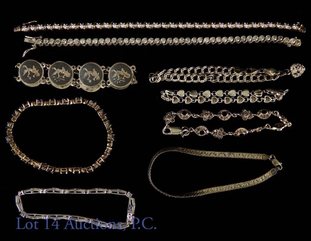 Sterling Silver Bracelets (10): 10, sterling silver bracelets. All marked 925 or sterling, many also marked Italy. Tennis bracelets and other styles. Average length: 7.5". Total weight: 96g.
