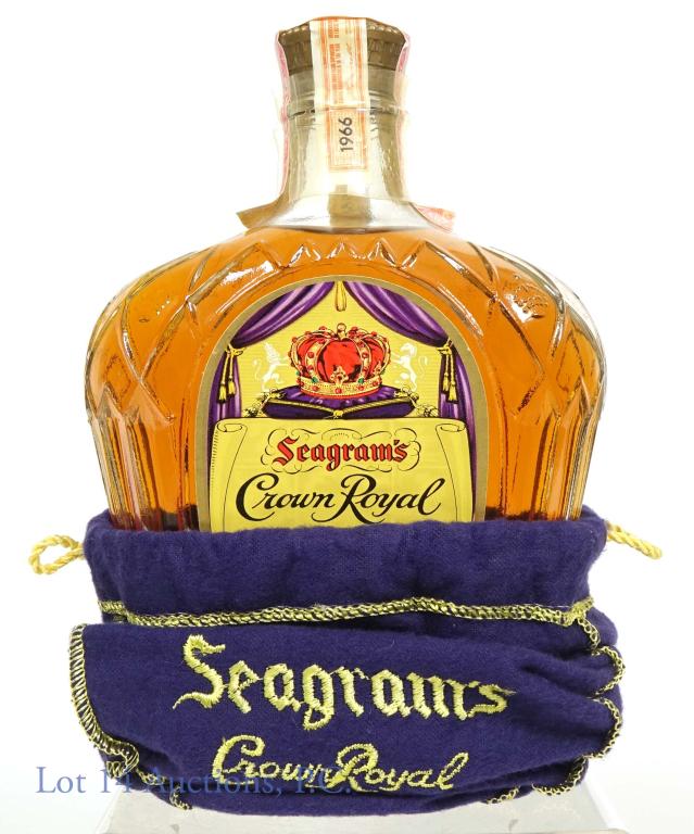 1966 Crown Royal Blended Canadian Whisky: 1966 Crown Royal fine deluxe blended Canadian whisky. 80 proof. 4/5 quart. Comes with purple drawstring bag.
