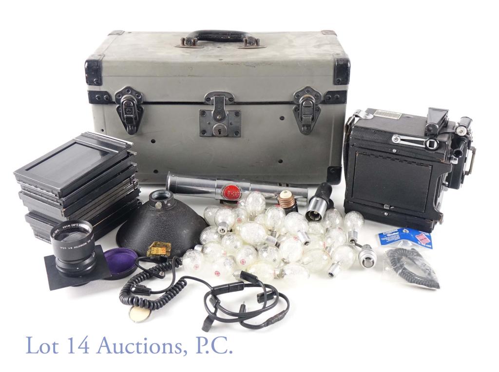 Graflex Speed Graphic 4x5 Camera, 2 Lenses Etc.: Graflex 4x5 camera with Kodak Ektar 4.7 / 127mm lens (S/N EO 586), with Kodak Series VI adapter and 25 cm (10") (Wollensak for) Graflex Tele-Optar f/5.6 lens (S/N 691120. Two No. 1233 Graphic Film Ada