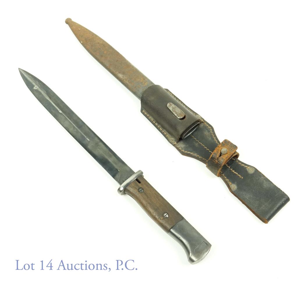 WWII German K98 Mauser Bayonet - Scabbard & Frog: WWII German K98 Mauser bayonet with matching scabbard and leather frog. Bayonet appears to be in overall nice condition with some wear from scabbard, use and age. Wooden handle is nicked a bit but not