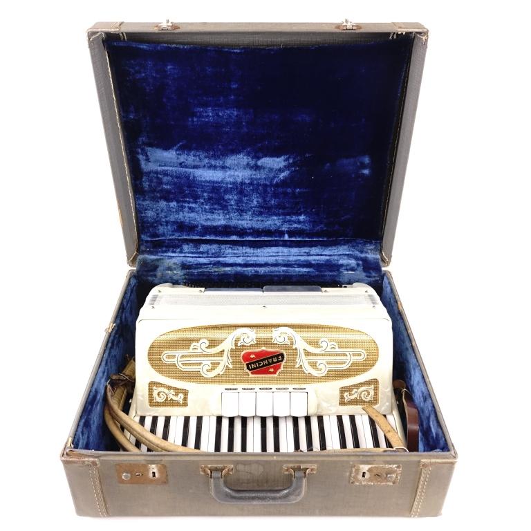 Francini Piano Accordion: In case. #63476. Appears to be in good condition, but untested and not serviced. Lot 14 will help facilitate local pick up OR Third Party Shipping only.