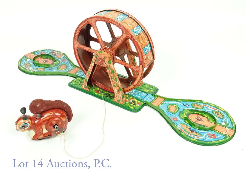 1950s Japanese Wind-Up TinLitho Kokyu Squirrel Toy: Mechanical wind-up squirrel toy with treadmill. Original key on original string. Working well. Some scratches to squirrel's paint and tail flocking. Complete and near-mint condition. Made in Japan by