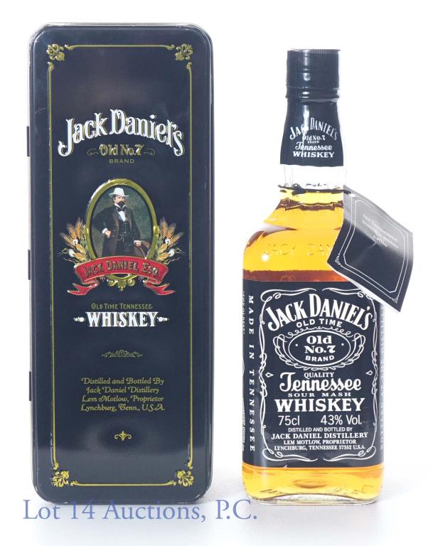 Jack Daniels Whiskey Tin ESQ 75 cl: Jack Daniel's Old No. 7 Tennessee sour mash whiskey. 86 proof. 75 cl (750 ml). Comes in "Old time Tennessee Whiskey" ESQ tin - neck tag is in different languages, and appears to have been made for an