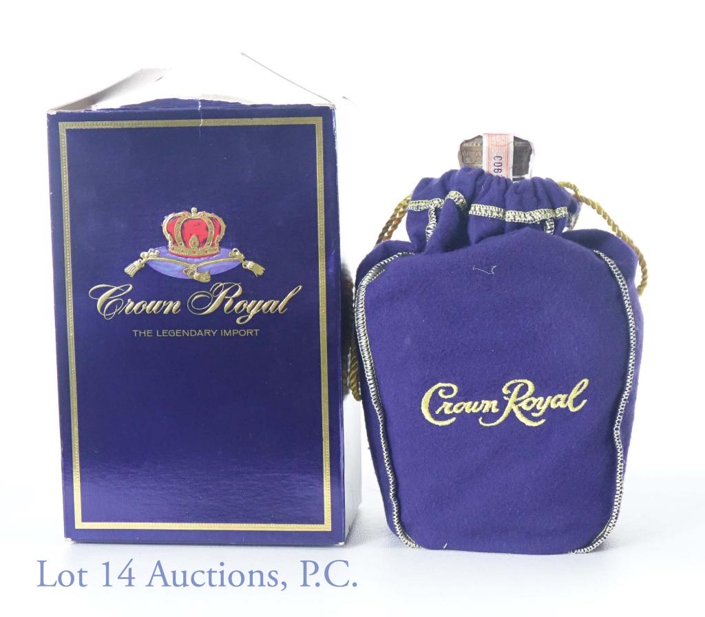 1970 Crown Royal Canadian Whisky: 1970 Crown Royal Fine Deluxe Blended Canadian Whisky. 80 proof. 750 ml. In (rougher condition) box with purple drawstring bag.