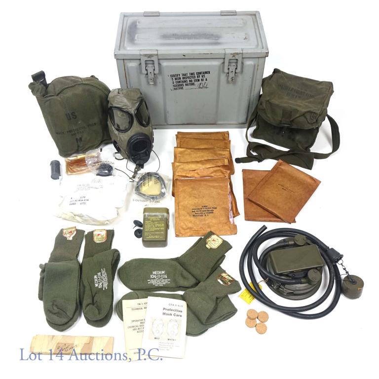 20mm Ammo Box, Bio Weapon Mask, Water Pur. Kit: 20mm ammo box, with socks, 1972 filter element, 1975 Chemical / Biological weapons mask in bag, with decontaminating and re-impregnating kit (individual, M-13). Bag is marked "US MASK, PROTECTIVE, FIE
