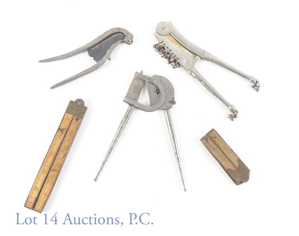 Antique Cutting Tools & Foldable Rulers: Three antique cutting tools. We think one may be a wire cutting / crimping tool. *** (2) foldable rulers. One unfolds to a 12 inch ruler which can be extended with a brass piece. The other is a Stanle