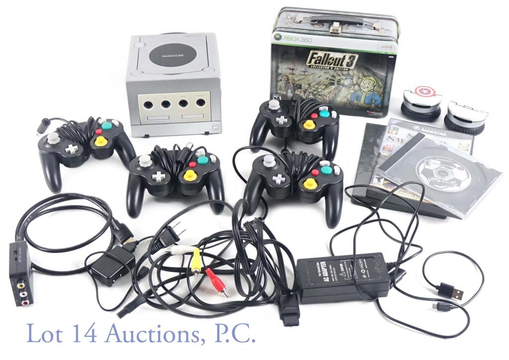 Nintendo GameCube Console & Games (4): Includes: Super Smash Bros Melee (in original case). Super Mario Strikers. Mario Kart: Double Dash. Also includes Fallout lunchbox with bonus Xbox 360 fallout game, and (empty) plastic form. GameCube 