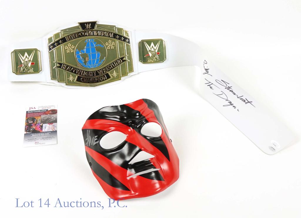Signed WWF / WWE Wrestling Memorabilia (COA) (2): Signed WWF / WWE Wrestling Memorabilia (COA) (2 Autographs Total). Includes a Glenn Jacobs "Kane" Signed Mask (Beckett COA) & a Ricky Steamboat "The Dragon" Signed Replica Belt (JSA COA). JSA Certific