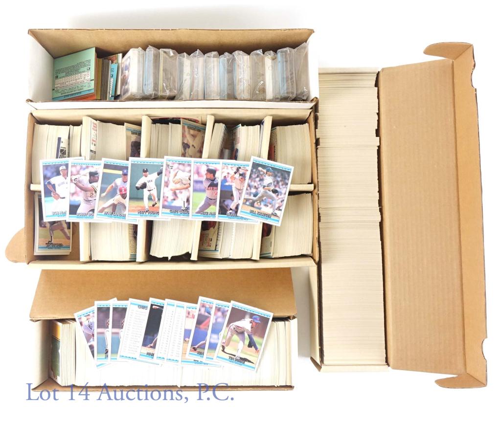 4 Boxes Of Baseball Cards 1980's And 1990's: Four boxes of baseball cards from the late 1980's and the early 1990's. The cards are mainly from Topps and Donruss. Two boxes have an assortment of cards from different years and manufacturers. One b