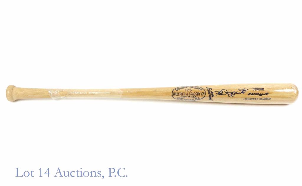 Phil Rizzuto Signed Baseball Bat: Phil Rizzuto signed Louisville Slugger Phil Rizzuto Signature model baseball bat. Embossed "016" on knob. Wrapped in plastic. Measures at 33-3/4" long. *** Lot 14 makes the following guaranty: If Prof