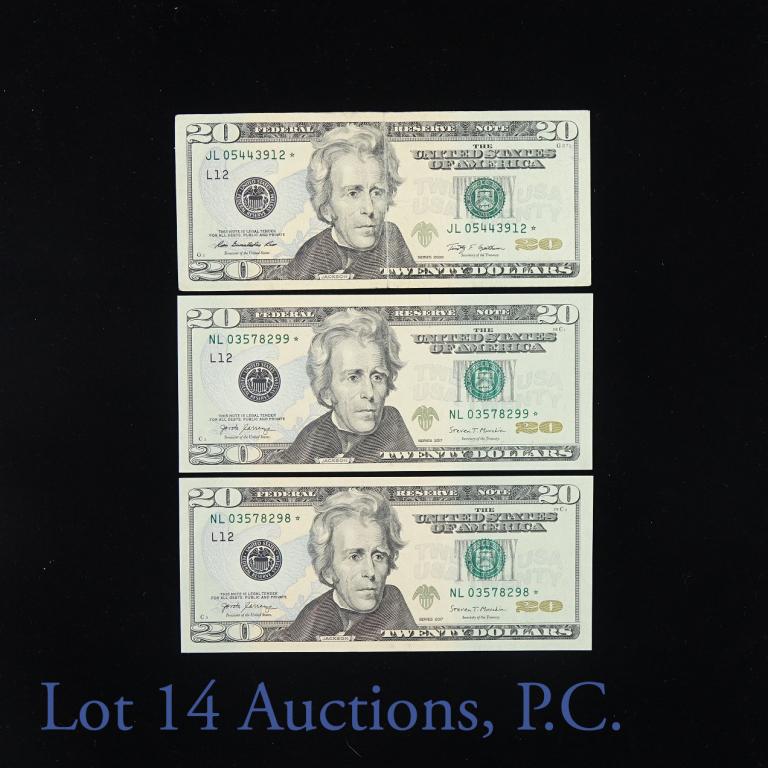 US $20 Star Notes (3) - 2 Consecutive Serial #s: (3) United States $20 notes - all STAR notes. (1) is a 2009 STAR note - it has a vertical crease. (2) are 2017 STAR notes - consecutive serial numbers and per consigner, crisp uncirculated. *** Lot 14
