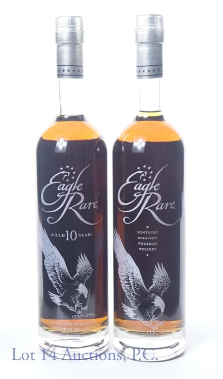 Eagle Rare Bourbon - 10 Yr - New & Old (2): 2 bottles of Eagle Rare Kentucky straight bourbon whiskey. 10 years. 90 proof. 750 ml. Etches: L22071 0114:28B and L22272? 0111:53B. Each bottle is of an older and newer design.