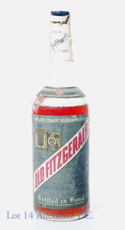 1942 Stitzel-Weller Old Fitzgerald Bonded Bourbon: Old Fitzgerald Bottled in Bond Made Spring 1942, Bottled Fall, 1949. Low shoulder fill. Good strip and rough cello. Illinois tax stamp. 100 proof, 4/5 quart. Bottle embossed "FEDERAL LAW FORBIDS SALE.