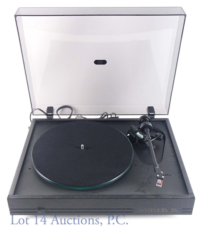 Systemdek IIX Turntable: Systemdek IIX Turntable; new old stock, with original shipping box. Minor markings on dust cover.