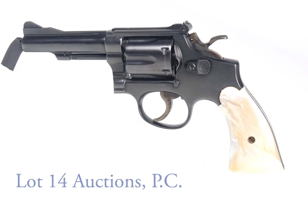 Smith & Wesson .38 Special CTG Handgun: Smith & Wesson 38 Special, blue finish, .38 caliber double action revolver. Barrel is stamped "38 S&W SPECIAL CTG.". Pearl grips. Nick to metal shield on right side, behind cylinder. S/N K15274 (frame