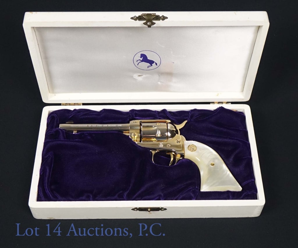 1965 Colt Frontier Scout Fort Des Moines 22 Cal.: Colt Frontier Scout .22LR caliber single action revolver commemorating the 1965 "Reconstruction of Old Fort DesMoines". Gold tone finish, 6 round capacity, in original wood presentation box. 4.5" barr