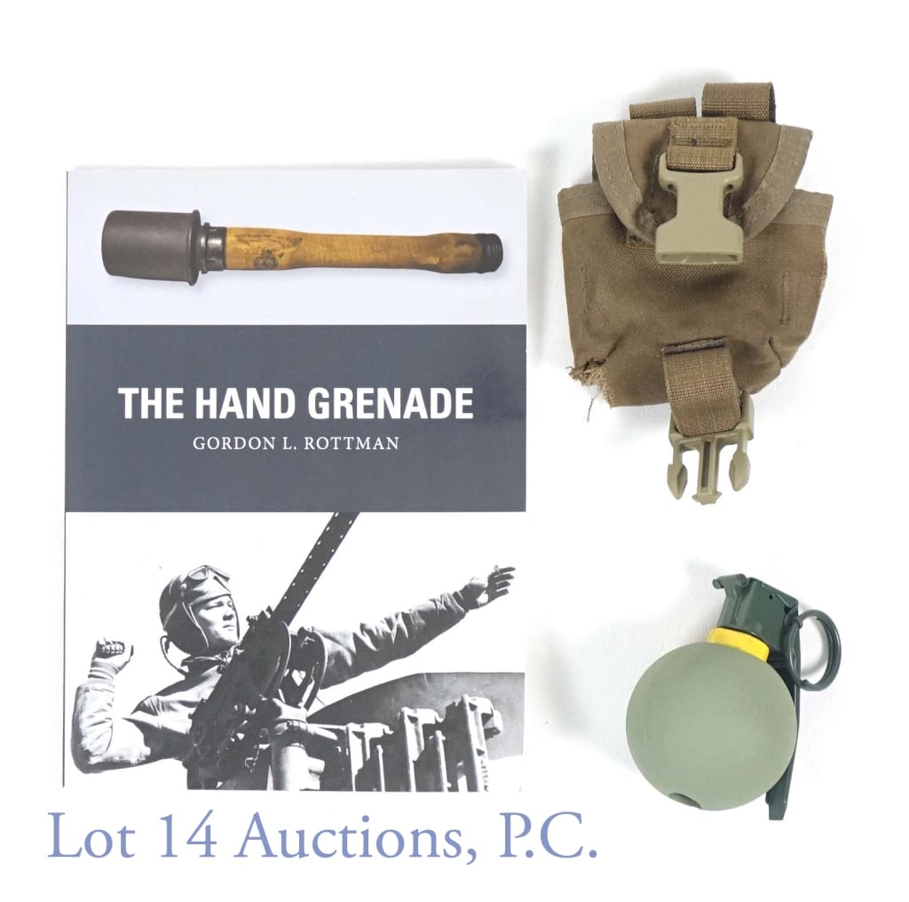 Inert M-67 Baseball Grenade - In Pouch: Inert M-67 baseball grenade. In a military issued grenade pouch. Book also included: "The Hand Grenade" by Gordon L. Rottman.