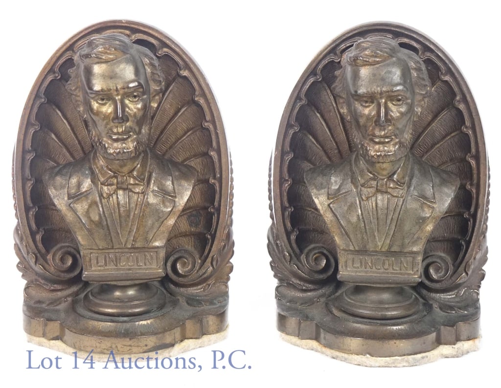 B & H Brass Abraham Lincoln Bookends: Bradley & Hubbard brass bookends with busts of Abraham Lincoln. Thick felt bottoms. 6.75" (17 cm) tall. 4.5" (11.5 cm) wide. 9.0 pounds (4.1 kg) total weight for the pair. Some scratches and light wea