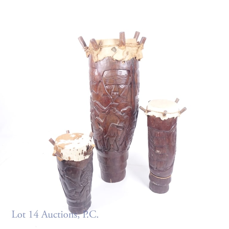 Hand Carved African Tribal Drum Set (3): LOCAL PICK UP OR THIRD PARTY SHIPPING ONLY!!!!! Set of 3 hand carved wooden African tribal drums. 2 drums are small head - 7" (17.75 cm) and 9" (23 cm) diameter - while the other is large head 11.5" (