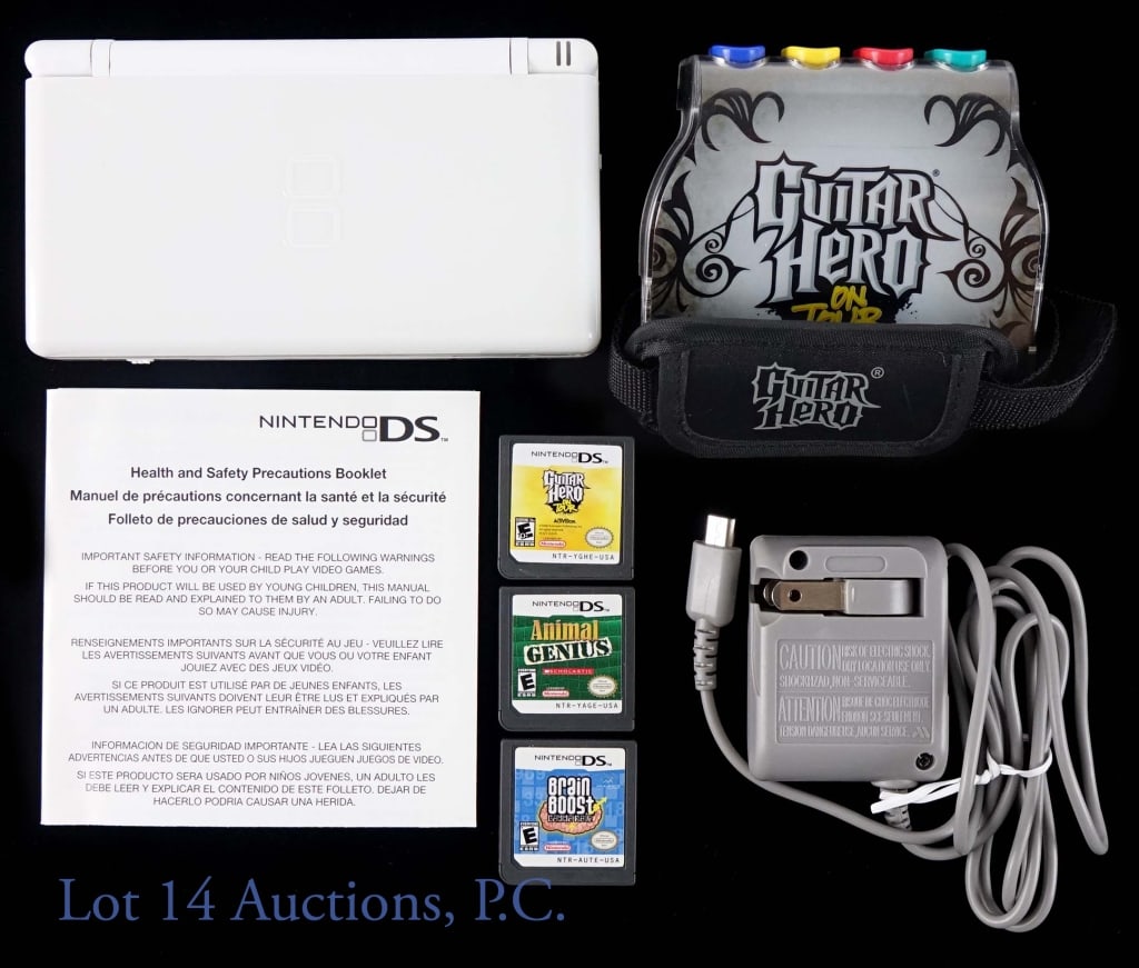 Nintendo DS Lite + Guitar Hero & More: Nintendo DS Lite - per consigner, working. Comes with instruction booklet, charger, and three games: Guitar Hero on Tour (with Guitar Hero controller), Animal Genius, Brain Boost Gamma Wave.