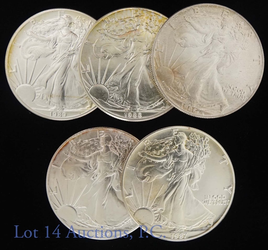 Silver Eagle Bullion Coins (5): 5 United States $1 Silver Eagle bullion coins - each coin is 1 troy ounce of 0.999 fine silver. 1986, 1987 (2), 1988, 1989.