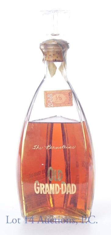 1950-1954 Old Grand-Dad Bonded Bourbon Whiskey: 1950 Barreled, 1954 bottled Old Grand-Dad Bottled in Bond Kentucky Straight Bourbon Whiskey. 100 proof, 4/5 quart. Low fill, strip is intact and stopper feels snug. Please see photos for condition and