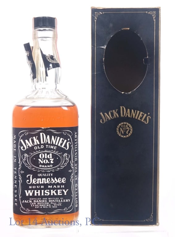 Jack Daniel's Whiskey - Cameo Box (No Cameo): Jack Daniel's Old No. 7 Tennessee sour mash whiskey. 90 proof. 4/5 quart. Shoulder fill. Series 112 (Internal Revenue) tax strip (1960 - 1977). 155-69 embossed on bottle bottom. Celo seal present but