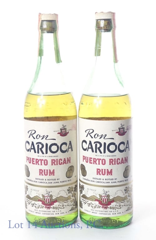 1960s Ron Carioca Puerto Rican Rum (2): Two 1960s Ron Carioca Puerto Rican Rum. Series 112 tax strips and bottles are embossed: "FEDERAL LAW FORBIDS...". 80 proof, 4/5 quart.