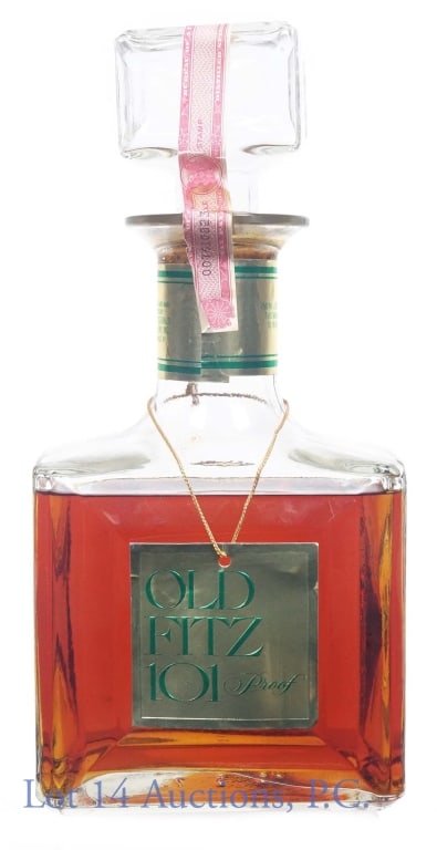 Old Fitzgerald Old Fitz 101 Bourbon - 10 Yr ***: Old Fitzgerald Old Fitz 101 Kentucky straight bourbon whiskey. 10 years. 101 proof. 750 ml (25.4 fluid ounces). Slightly less than shoulder fill. Neck tag present. Series 112 (ATF) tax strip is partia