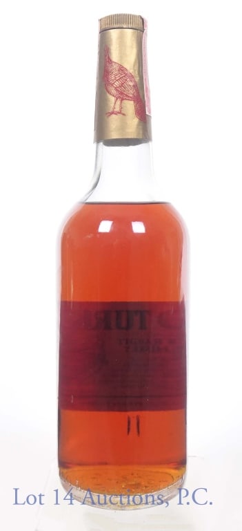 1979 Wild Turkey Bourbon Whiskey (No Front Label): Wild Turkey Kentucky straight bourbon whiskey. 8 years. 101 proof. 750 ml (25.4 fl oz). Series 112 (ATF) tax strip (1977 - 1982). Front label is missing.