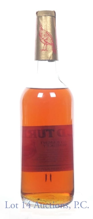 1979 Wild Turkey Bourbon Whiskey (No Front Label): Wild Turkey Kentucky straight bourbon whiskey. 8 years. 101 proof. 750 ml (25.4 fl oz). Series 112 (ATF) tax strip (1977 - 1982). Front label is missing.