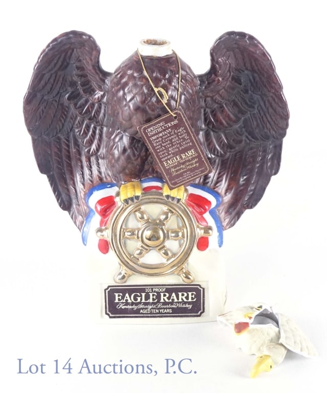 1982 Eagle Rare Bourbon - Eagle Decanter ***: 1982 Eagle Rare Kentucky straight bourbon whiskey. 10 years. 101 proof. 750 ml. Eagle decanter No.4 in a series. ***NOT sealed - the head of the decanter is broken in multiple pieces. Weight of decant