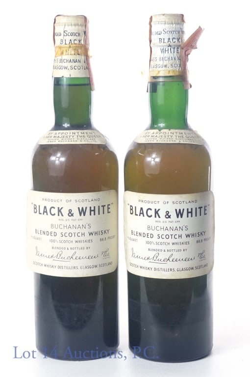 Buchanan's Black & White Scotch Spring Cap (2): Two vintage spring cap bottles of Buchanan's Black & White blended scotch whisky. 86.8 proof, 4/5 quart. Series 111 tax strips (1944-1960) and part of original cello present.